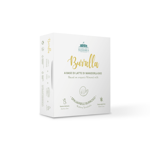 Burrella alternativa vegetale al burro spalmata su pane tostato con verdure grigliate in una cucina luminosa